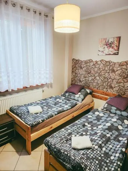 Pokoje i wnętrza Pensjonatu Li-Mar w Piszu — zdjęcie 14